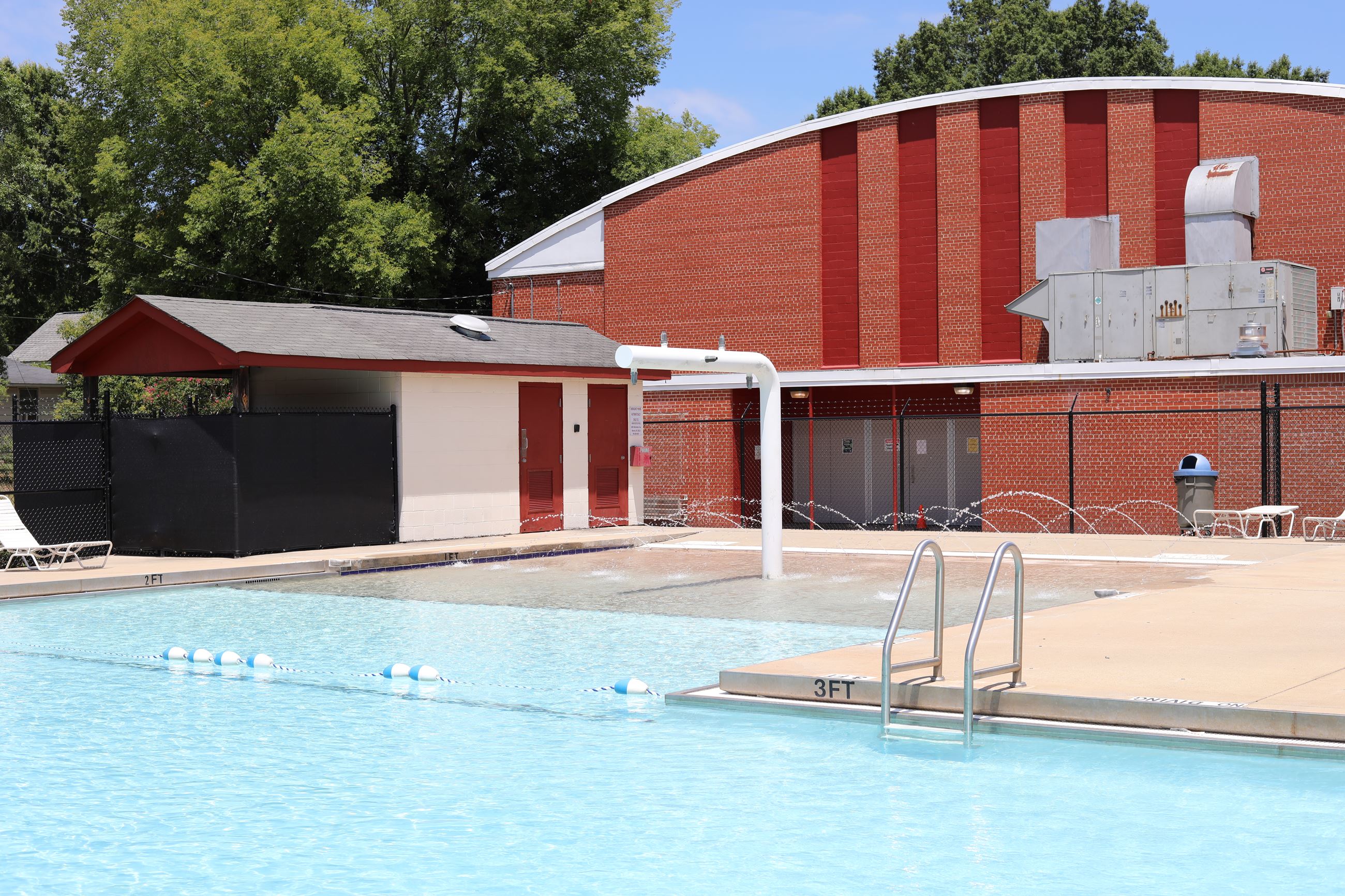 Winchester Gym Building Behind Pool shallow end